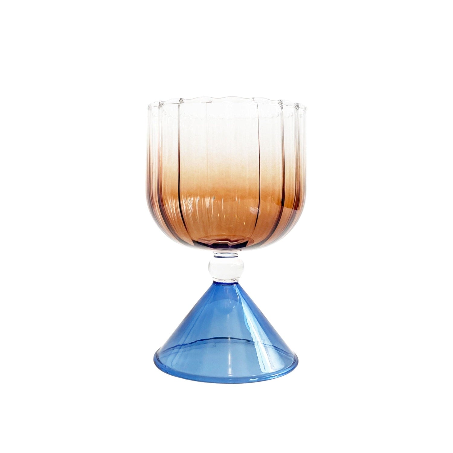 Bespoke handblown borosilicate cocktail & wine glass with gradient amber color, curved rim. Azure blue stand on a white background
