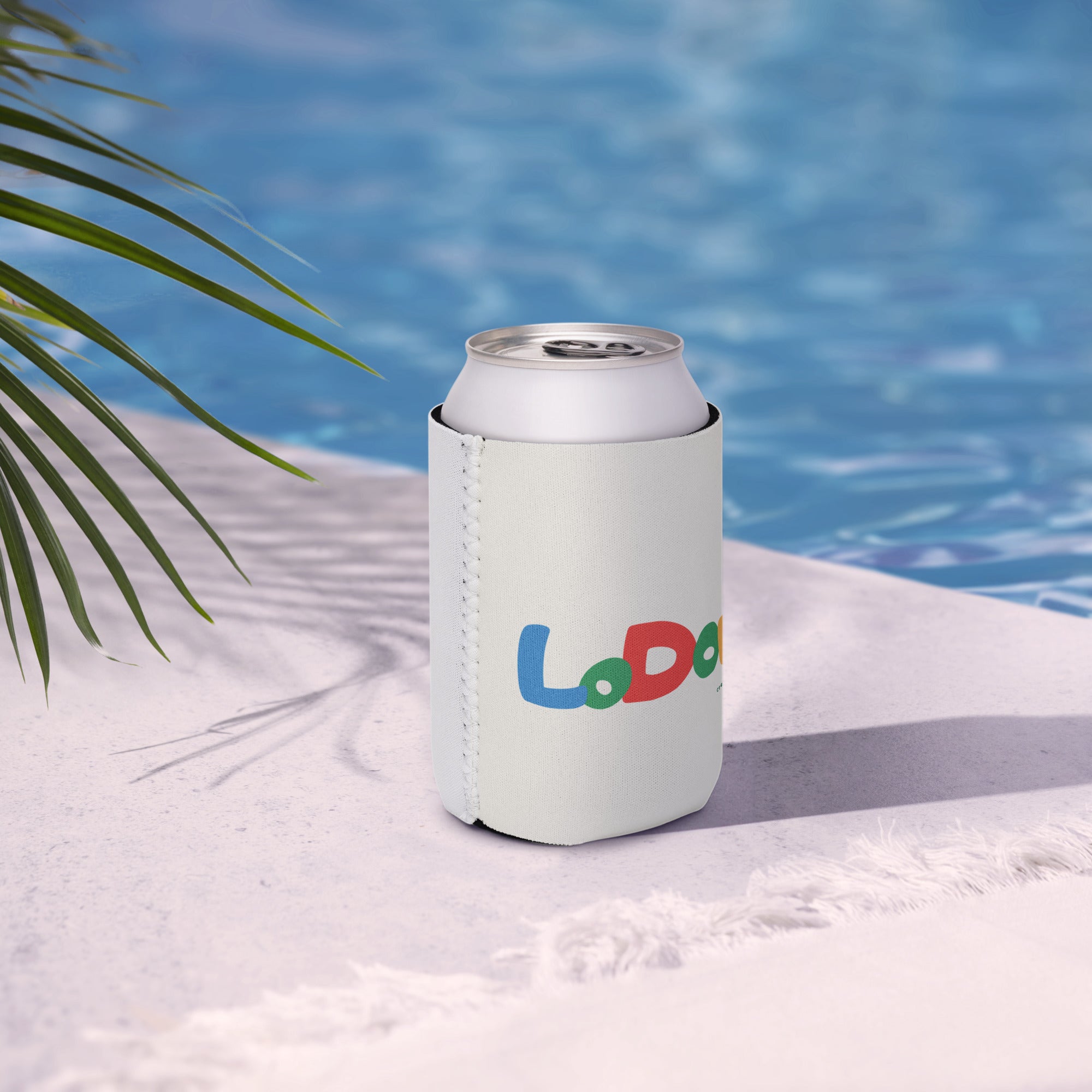 White can cooler with 'Lodoré' branding by a poolside, 12oz size