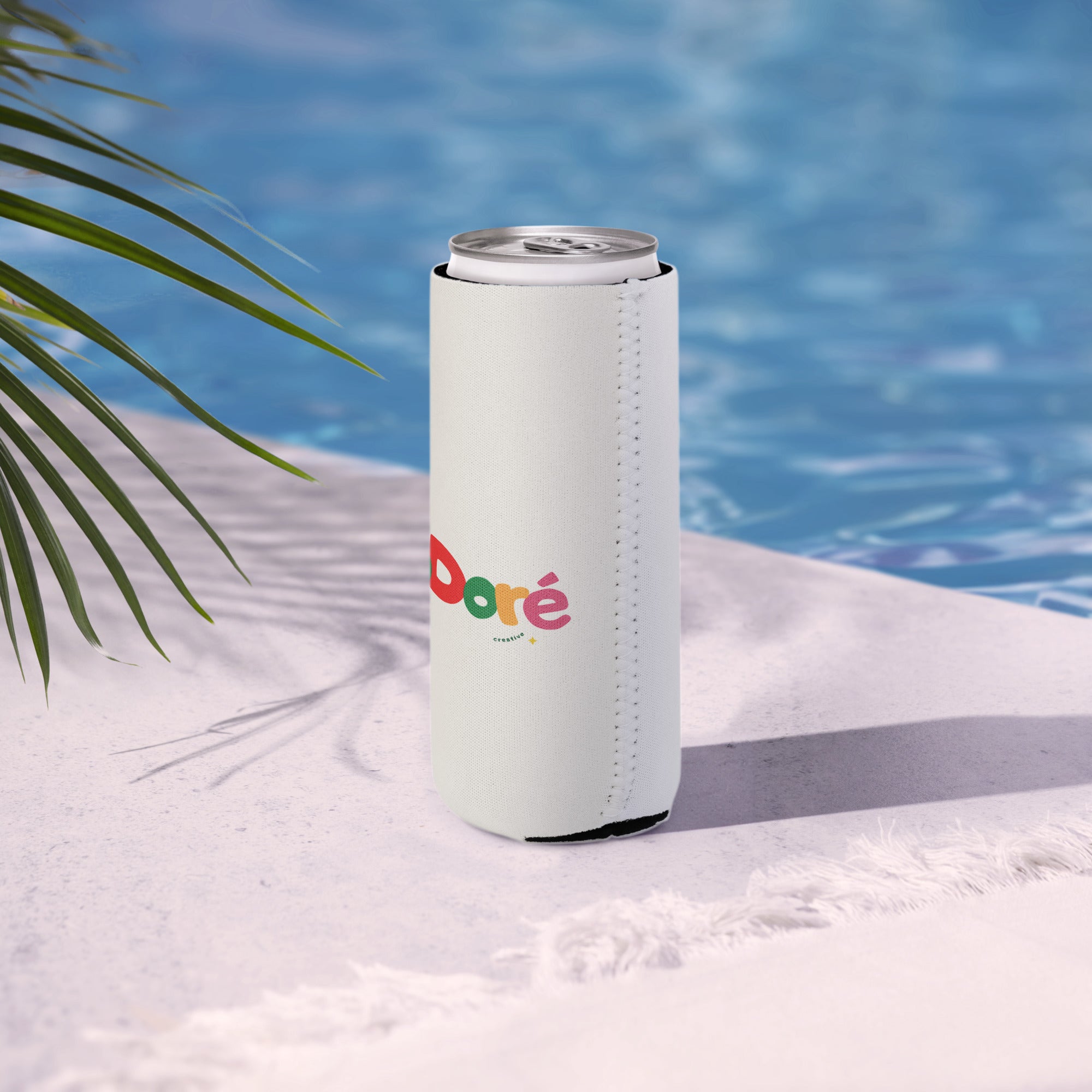 Slim White can cooler with 'Lodoré' branding by a poolside